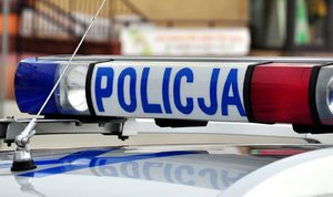 napis Policja  sygnały świetlne